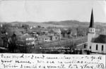 View of Whitehall taken from the top of the old courthouse, old Lutheran church is on the right. Photo approx 1910
